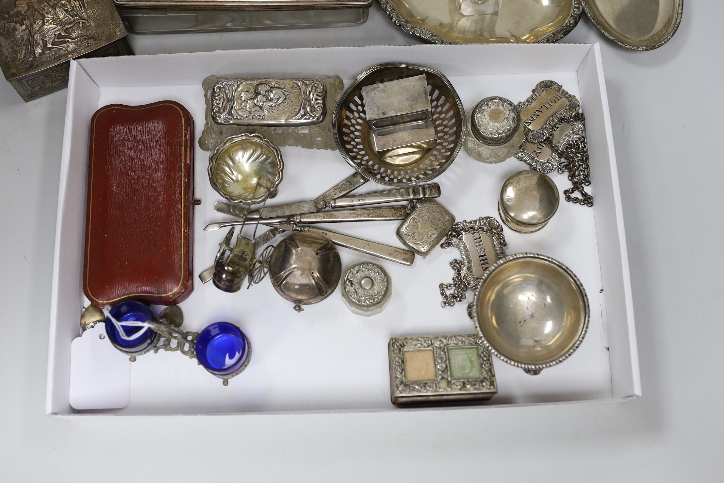 Three Victorian silver decanter labels, by Charles Stuart Harris, London, 1894, an Edwardian repousse silver mounted double stamp case, Birmingham, 1906, 63mm, sundry other small silver including vesta case mounted glass